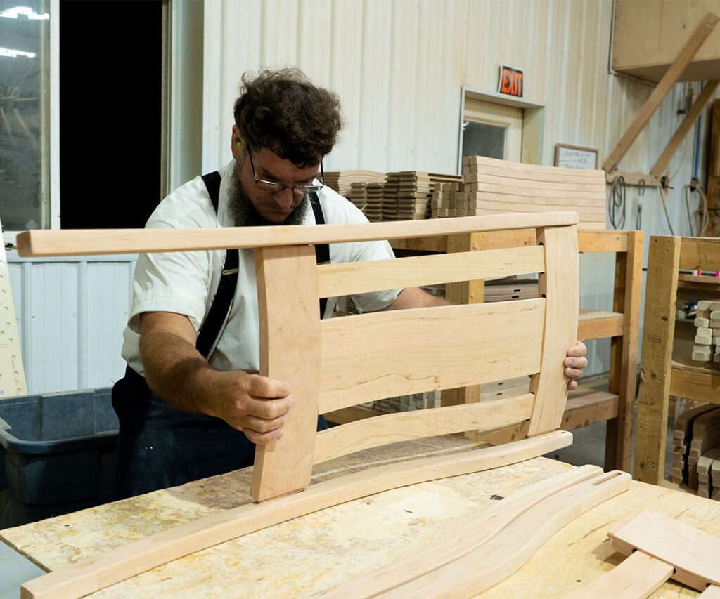 Amish craftsman working with quality materials
