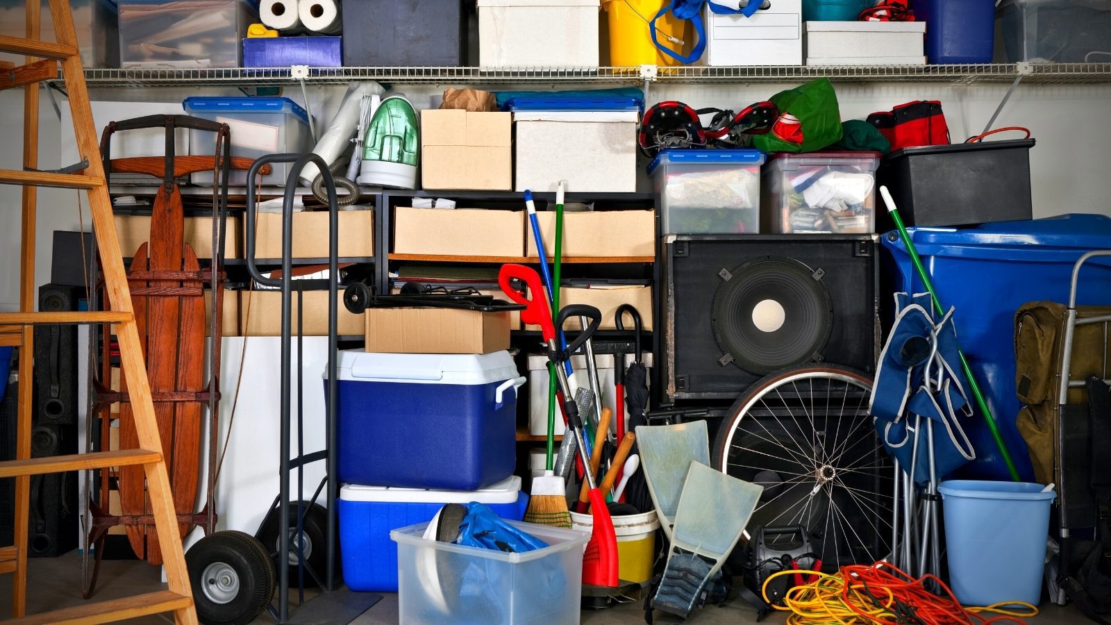 Cluttered and disorganized garage showing need for proper storage